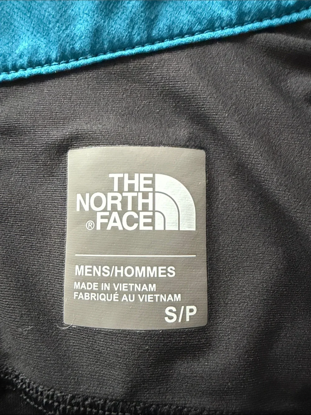 The North Face Black Jacket with Blue Trim